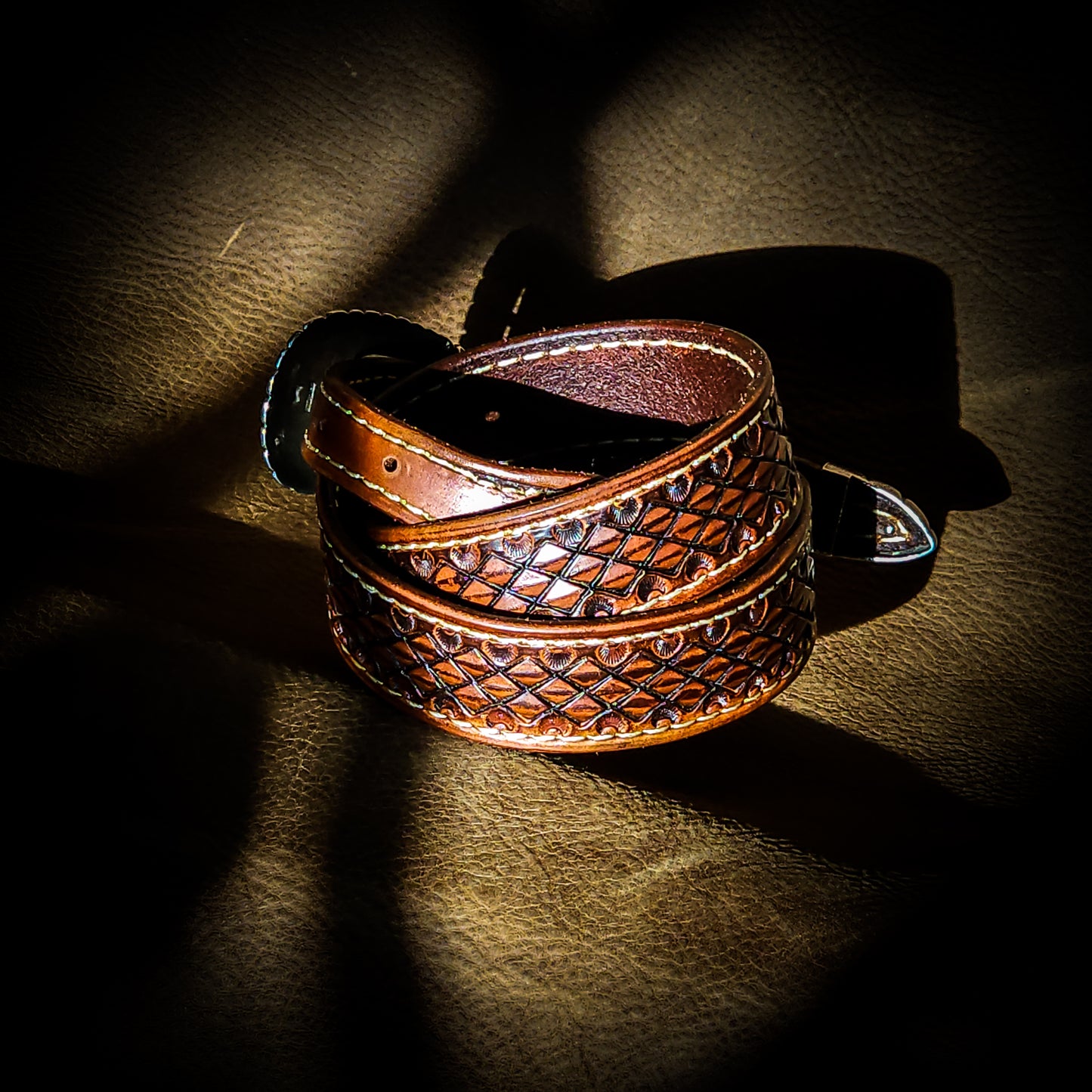 Hand tooled belts