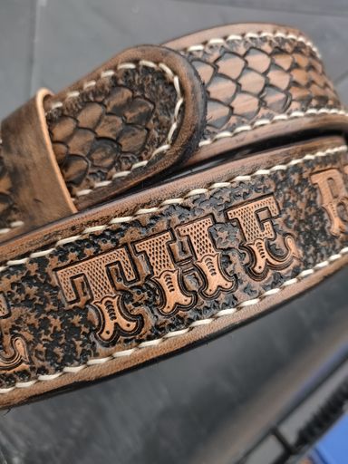 Hand tooled belts